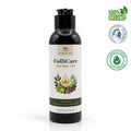 Herbal oil bottle labeled 'FolliCare' with organic and clinically tested logos on a white background